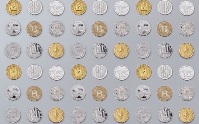 A seamless pattern of various cryptocurrency coins in gold and silver tones.